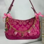 Y2K hot pink mini Demi coach shoulder bag from 2003 💞